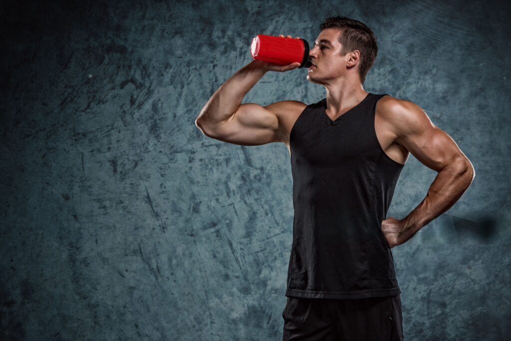 man drinking protein shake